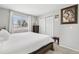 Bedroom with a neutral color scheme, carpet, and a large window at 14791 E Security Pl, Aurora, CO 80011