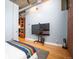 Cozy bedroom offers hardwood floors, modern decor, and a comfortable space to relax at 1720 Wazee St # 3B, Denver, CO 80202