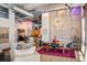 Bright living room with hardwood floors, modern furniture, and exposed ductwork features an industrial aesthetic at 1720 Wazee St # 3B, Denver, CO 80202