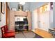 Home office features multi-screen setup, hardwood floors, and overhead cabinets at 1720 Wazee St # 3B, Denver, CO 80202