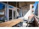 Inviting patio area with outdoor seating, dining table, and direct access to the interior space at 1720 Wazee St # 3B, Denver, CO 80202