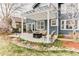 Spacious backyard featuring a patio with a pergola, seating area with a fire pit, and a play set at 10882 Bullock Ct, Parker, CO 80134
