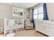 Serene Bedroom with white furniture, a ceiling fan, and soft, neutral tones at 10882 Bullock Ct, Parker, CO 80134