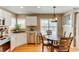 Eat-in kitchen area with stainless steel appliances and granite countertops at 10882 Bullock Ct, Parker, CO 80134