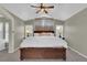 Large main bedroom features a vaulted ceiling, plush carpet, and neutral paint at 10882 Bullock Ct, Parker, CO 80134