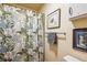 Bathroom featuring a shower with a floral curtain and neutral wall paint at 850 Idalia Cir, Aurora, CO 80011