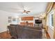 Comfortable living room featuring hardwood floors and a ceiling fan at 850 Idalia Cir, Aurora, CO 80011