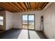 Unfinished basement with sliding glass doors leading to an outdoor view at 12071 S Tallkid Ct, Parker, CO 80138