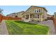 Backyard featuring well maintained lawn, wooden fence and patio at 14067 Hudson St, Thornton, CO 80602