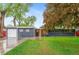 Inviting exterior of a one-story home featuring a well-maintained lawn and attractive curb appeal at 4405 Gardenia St, Golden, CO 80403