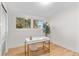 Office space with hardwood floors, a modern desk, and bright windows that let in plenty of natural light at 4405 Gardenia St, Golden, CO 80403