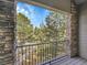 Balcony view framed by stone columns and iron railings, offering an inviting outdoor space at 9085 E Phillips Dr, Centennial, CO 80112
