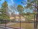 Breathtaking view of pond, landscaping, and walking paths from private balcony at 9085 E Phillips Dr, Centennial, CO 80112