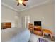 Cozy bedroom with neutral tones, en-suite bathroom, and modern decor at 9085 E Phillips Dr, Centennial, CO 80112