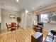 Inviting living area features wood floors, large window, and comfortable seating at 9085 E Phillips Dr, Centennial, CO 80112