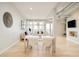 Light and airy dining area with a modern table and chairs at 3198 Blake St # 402, Denver, CO 80205