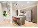 Modern kitchen with stainless steel appliances and an island at 3198 Blake St # 402, Denver, CO 80205