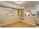 Dining room with wood floors and built in shelving near the kitchen at 2182 Eagle Ave, Superior, CO 80027