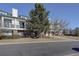 Charming townhome exterior with brick accents, balconies, and lush landscaping creating a welcoming atmosphere at 2182 Eagle Ave, Superior, CO 80027