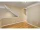 Open living room with wood flooring featuring neutral walls and ample lighting at 2182 Eagle Ave, Superior, CO 80027