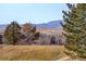 Scenic view with trees and hills, showcasing the natural beauty surrounding the community at 2182 Eagle Ave, Superior, CO 80027