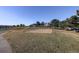 Community sand volleyball court surrounded by a grassy field, perfect for outdoor recreation at 2182 Eagle Ave, Superior, CO 80027