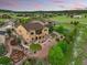 Aerial view featuring the home, landscaped yard, and serene surroundings at 15506 Short Line Ct, Monument, CO 80132