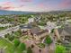 Aerial view of a residential neighborhood with mountain views and well-maintained homes at 15506 Short Line Ct, Monument, CO 80132
