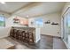 Basement bar area featuring counter seating, storage cabinets and modern decor at 15506 Short Line Ct, Monument, CO 80132