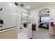 This bathroom features a rainfall shower with stylish tile and glass enclosure at 15506 Short Line Ct, Monument, CO 80132