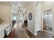 Inviting entryway with wood floors and access to other rooms in the house at 15506 Short Line Ct, Monument, CO 80132