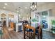 Eat-in kitchen features stainless appliances and breakfast nook sliding door to the outside patio at 15506 Short Line Ct, Monument, CO 80132