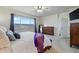 Comfortable main bedroom has a ceiling fan, and large windows for plenty of natural light at 15506 Short Line Ct, Monument, CO 80132