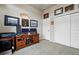 Home office featuring a wall-mounted decor and a closet with sliding doors at 15506 Short Line Ct, Monument, CO 80132