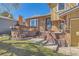 Charming entryway with a covered porch and brick detailing, perfect for welcoming guests at 4593 S Field St, Littleton, CO 80123