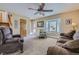 Comfortable living room with a large bay window providing ample natural light at 4593 S Field St, Littleton, CO 80123