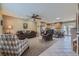 Open-concept living area seamlessly flows into the kitchen, perfect for entertaining at 4593 S Field St, Littleton, CO 80123