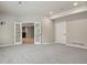 Basement area with french doors, carpet, pot lights, and separate entrance at 2485 Vale Way, Erie, CO 80516