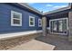 Inviting front porch with stone accents and a charming entryway that welcomes you home at 2485 Vale Way, Erie, CO 80516