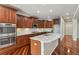 Gourmet kitchen featuring stainless steel appliances, granite countertops, and ample cabinet space at 2485 Vale Way, Erie, CO 80516