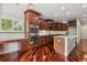 Gourmet kitchen featuring stainless steel appliances, granite countertops, and ample cabinet space at 2485 Vale Way, Erie, CO 80516