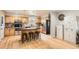 Bright kitchen featuring stainless steel appliances, ample cabinet space, and a functional center island at 1819 S Nile Ct, Aurora, CO 80012