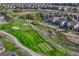 Aerial view of golf course and neighborhood; a beautiful place to live at 8107 S Catawba Ct, Aurora, CO 80016