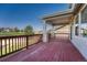 Inviting back deck offers great views and covered space for entertaining at 8107 S Catawba Ct, Aurora, CO 80016