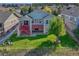 A high angle exterior view showcasing the backyard, deck, and surrounding neighborhood at 8107 S Catawba Ct, Aurora, CO 80016