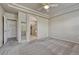 The main bedroom features a tray ceiling, and an ensuite bathroom with walk-in shower at 8107 S Catawba Ct, Aurora, CO 80016