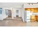 Living room with wood-look floors and stone fireplace at 13651 E Yale Ave # C, Aurora, CO 80014