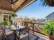 Relax on the back deck with outdoor dining, ceiling fan and views of the serene outdoor scenery at 6266 W Prentice Ave, Littleton, CO 80123