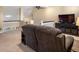 Relax in the inviting living area with cozy furniture, ample space, and a great view of the surroundings at 6266 W Prentice Ave, Littleton, CO 80123