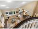 Spacious open-concept living room with vaulted ceilings, abundant natural light, and hardwood floors, ideal for gatherings at 6266 W Prentice Ave, Littleton, CO 80123